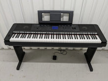 Load image into Gallery viewer, Yamaha DGX-660 black portable grand piano keyboard and stand stock #24011