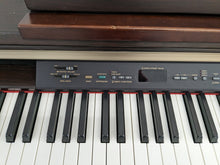 Load image into Gallery viewer, Yamaha Clavinova CLP-130 Digital Piano and stool in dark rosewood stock #23161
