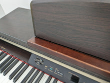 Load image into Gallery viewer, Yamaha Clavinova CLP-130 Digital Piano and stool in dark rosewood stock #23161