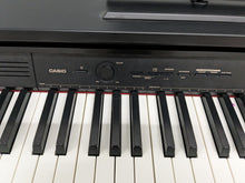 Load image into Gallery viewer, CASIO CELVIANO AP-250 DIGITAL PIANO AND DOUBLE STOOL IN SATIN BLACK stock #23166