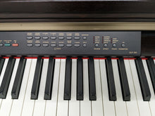 Load image into Gallery viewer, Yamaha Clavinova CLP-130 Digital Piano and stool in dark rosewood stock #23185
