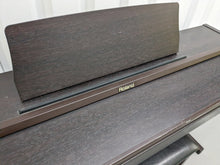 Load image into Gallery viewer, Roland RP101 Digital Piano and matching stool in rosewood Stock # 23192