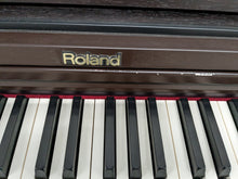 Load image into Gallery viewer, Roland RP101 Digital Piano and matching stool in rosewood Stock # 23192