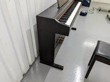 Load image into Gallery viewer, Roland RP101 Digital Piano and matching stool in rosewood Stock # 23192