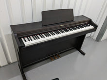 Load image into Gallery viewer, Roland RP101 Digital Piano and matching stool in rosewood Stock # 23192