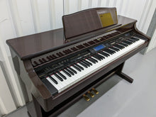 Load image into Gallery viewer, Roland KR-575 Intelligent Digital Piano / arranger glossy mahogany stock # 23194