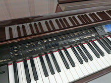 Load image into Gallery viewer, Roland KR-575 Intelligent Digital Piano / arranger glossy mahogany stock # 23194