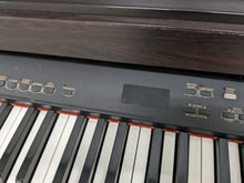 Load image into Gallery viewer, Yamaha Clavinova CLP-820 Digital Piano in dark rosewood stock nr 23204