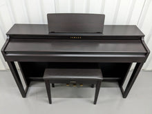 Load image into Gallery viewer, Yamaha clavinova CLP-525 digital piano and stool in dark rosewood stock # 23207