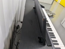 Load image into Gallery viewer, Roland RP201 Digital Piano in satin black finish Stock # 23230