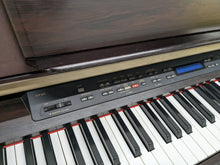 Load image into Gallery viewer, Yamaha Clavinova CLP-970 Digital Piano and stool in rosewood stock #23270