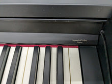Load image into Gallery viewer, Roland RP401R digital piano and stool in satin black finish stock number 23265