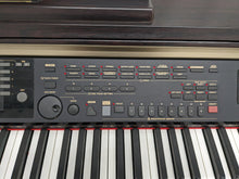 Load image into Gallery viewer, Yamaha Clavinova CVP-301 Digital Piano / arranger in rosewood. stock # 23275
