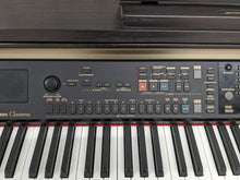 Load image into Gallery viewer, Yamaha Clavinova CVP-301 Digital Piano / arranger in rosewood. stock # 23275