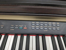 Load image into Gallery viewer, Yamaha Clavinova CLP-120 Digital Piano and stool in dark rosewood stock #23283