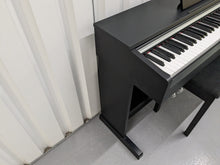 Load image into Gallery viewer, Yamaha Arius YDP-142 Digital Piano and stool in satin black stock #23286