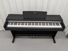 Load image into Gallery viewer, Yamaha Arius YDP-142 Digital Piano in satin black stock #23322