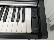 Load image into Gallery viewer, Yamaha Arius YDP-142 Digital Piano in satin black stock #23322