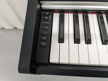 Load image into Gallery viewer, Yamaha Arius YDP-142 Digital Piano in satin black stock #23322