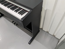 Load image into Gallery viewer, Yamaha Arius YDP-142 Digital Piano in satin black stock #23322