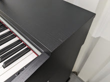 Load image into Gallery viewer, Yamaha Arius YDP-142 Digital Piano in satin black stock #23322
