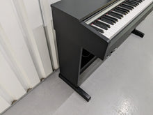 Load image into Gallery viewer, Yamaha Arius YDP-142 Digital Piano in satin black stock #23322