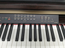 Load image into Gallery viewer, Yamaha Clavinova CLP-120 Digital Piano in dark rosewood stock #23325