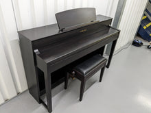 Load image into Gallery viewer, Yamaha Clavinova CLP-575 digital piano + stool in dark rosewood stock nr 23324