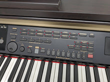 Load image into Gallery viewer, Yamaha Clavinova CVP-301 Digital Piano / arranger in rosewood. stock # 23343