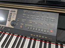 Load image into Gallery viewer, Yamaha Clavinova CVP-209 in Polished Ebony with matching stool. stock nr 23337