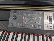Load image into Gallery viewer, Yamaha Clavinova CVP-209 in Polished Ebony with matching stool. stock nr 23337