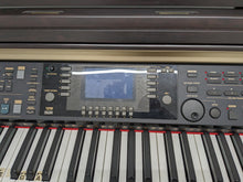 Load image into Gallery viewer, Yamaha Clavinova CVP-301 Digital Piano / arranger in rosewood. stock # 23344