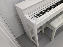 Load image into Gallery viewer, Yamaha Clavinova CLP-545 digital piano in satin white with stool. stock nr 23369