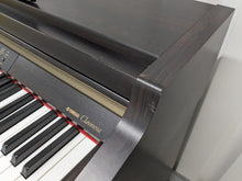 Load image into Gallery viewer, Yamaha Clavinova CLP-930 Digital Piano in dark rosewood stock #23373