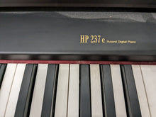 Load image into Gallery viewer, Roland HP237e Digital Piano in dark rosewood finish Stock nr 23407