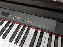 Load image into Gallery viewer, Yamaha Clavinova CLP-511 Digital Piano and stool in rosewood stock # 23413