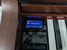 Load image into Gallery viewer, Yamaha Clavinova CLP-535 digital piano and stool in mahogany finish stock number 23418