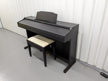 Load image into Gallery viewer, Roland RP401R digital piano and stool in dar rosewood finish stock number 23423