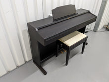 Load image into Gallery viewer, Roland RP401R digital piano and stool in dar rosewood finish stock number 23423