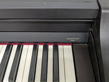 Load image into Gallery viewer, Roland RP401R digital piano and stool in dar rosewood finish stock number 23423