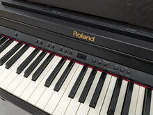 Load image into Gallery viewer, Roland RP401R digital piano and stool in dar rosewood finish stock number 23423