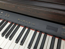 Load image into Gallery viewer, Yamaha Clavinova CLP-820 Digital Piano in dark rosewood stock nr 23419