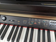 Load image into Gallery viewer, Yamaha Clavinova CLP-150 Digital Piano and stool in dark rosewood stock #23443
