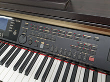 Load image into Gallery viewer, Yamaha Clavinova CVP-301 Digital Piano / arranger in rosewood. stock # 23444