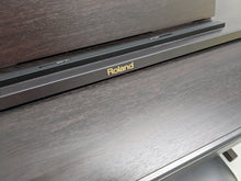 Load image into Gallery viewer, Roland RP401R digital piano and stool in dar rosewood finish stock number 23450