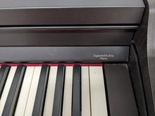 Load image into Gallery viewer, Roland RP401R digital piano and stool in dar rosewood finish stock number 23450