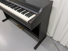 Load image into Gallery viewer, Roland RP401R digital piano and stool in dar rosewood finish stock number 23450