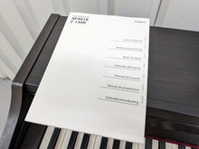 Load image into Gallery viewer, Roland RP401R digital piano and stool in dar rosewood finish stock number 23450