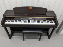 Load image into Gallery viewer, Yamaha Clavinova CLP-150 Digital Piano and stool in dark rosewood stock #23460