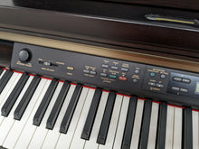 Load image into Gallery viewer, Yamaha Clavinova CLP-150 Digital Piano and stool in dark rosewood stock #23460